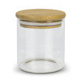 A round glass storage canister with a natural bamboo lid, perfect for tea and coffee accessories.