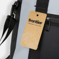 A grey cooler bag with black accents, featuring a tag and a strap attachment. Includes a logo.