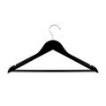 A black wooden hanger with a silver hook features a sleek design and curved edges.