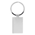 A silver keychain with a rectangular tag and a circular keyring. It features a smooth, shiny surface.