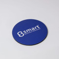 A round, blue coaster with a black underside and a white branding logo.