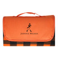 An orange picnic blanket with a checkered design and a logo on the front.