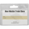 A clear plastic badge holder with a top slot for attachment and space for a name and company details.