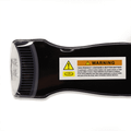 A black magnetic flashlight with two LED lights, featuring a warning label and a visible battery compartment.