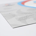 A magnetic jigsaw puzzle, featuring a colourful design with blue, red, and grey elements, showcasing a logo.