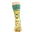 Bright yellow socks featuring a leaf pattern in green, red, and blue, with a green cuff and branding on top.