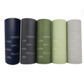 A drink bottle collection featuring navy, dark grey, olive green, light green, and grey colours, each with a logo.