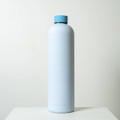 A drink bottle in a light blue colour with a blue cap. The bottle features a logo on its surface.