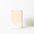 A drink cooler in a light brown box, featuring a simple design and a logo.