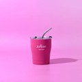 A drink bottle in vibrant pink with a clear lid and straw, featuring a logo on the front.