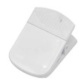 A white magnetic clip designed for holding papers or items securely, featuring a textured grip area.
