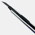 A sleek silver and black retractable box cutter with a rubber grip and blade exposed. It features a logo on the handle.