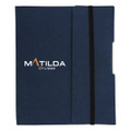 A navy blue Small Tuck Journal Book with an elastic closure and a logo on the cover.