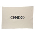 A cotton tea towel in a natural beige colour featuring a logo in a bold, modern font.