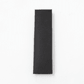 A sleek black gift box designed to hold a pen. The box has a textured surface and features a logo.