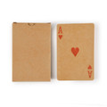 A deck of recycled playing cards in a brown cardboard box, featuring a red Ace of Hearts on top.