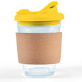 A reusable coffee cup featuring a transparent design, a yellow snap lid, and a cork band for grip.