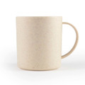 A reusable coffee cup in a light beige colour with a speckled design and a handle. It features a logo.