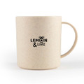 A cream-coloured mug with a textured finish and a logo. It has a curved handle and a round body.