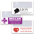A collection of credit card-sized magnifiers in white, featuring various logos and branding in purple and black.