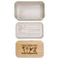 A beige lunch box with a bamboo lid, containing utensils including a fork and spoon. It features a logo.