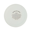 A natural soy candle with a warning label on the bottom, detailing safety instructions.