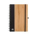 A spiral-bound A5 notebook with a bamboo cover and a black fabric side, featuring a black elastic band closure.