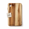 A wooden cheese board with a natural finish, featuring a circular hole and a branded tag.