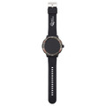 A black smart watch with a round face and adjustable strap, featuring a logo on the dial.