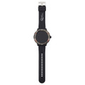 A black smart watch with a round face and a silicone strap, featuring a metallic bezel and a logo.