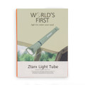 A green foldable camp light is displayed against a natural background, featuring a logo on the product.