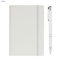 A white A5 notebook with a grey elastic band and a matching white pen. The notebook has a logo on the cover.