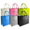 Avenue Felt Shopper tote bags in white, pink, lime green, blue, grey, and black, featuring dual handles and an internal logo.