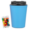 A drink bottle in light blue with a black lid, accompanied by a packet of colourful jelly beans.