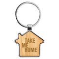 A bamboo key ring shaped like a house, featuring a metallic ring and engraved text.