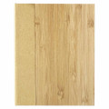 A bamboo textured sticky notes pad with a natural light brown cover, featuring a logo on the side.