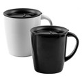 A coffee mug set featuring a black and a white mug, both with a black lid and handles. Each mug has a logo.