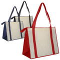 Three non-woven large zipped shopping bags in red, navy, and black, each with contrasting straps and a logo.