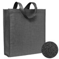A premium patterned non-woven tote bag in black, featuring two sturdy handles and a textured design.