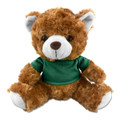 A plush teddy bear in brown fur, wearing a green shirt, with black eyes and white inner ears. It has a logo on the shirt.