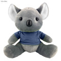 A grey koala plush toy wearing a navy blue shirt, with large ears and a cute expression, featuring a logo.