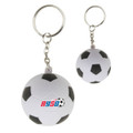 A stress soccer ball key ring in white and black, featuring a logo and attached to a silver keychain.