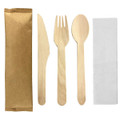 A wooden cutlery set featuring a knife, fork, spoon, and napkin, all in natural wood tones.