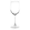 A clear glass wine glass with an elegantly shaped bowl and a stem, designed for serving wine.