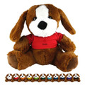 A plush brown dog with floppy ears, wearing a red shirt, surrounded by smaller versions in various colours.