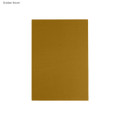 A golden brown B5 notebook with a plain cover and no visible text or images. It has a simple design and branding.