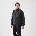 A man wearing a black Men's Cirrus Bonded Jacket, featuring a zip front and side pockets, with a logo on the sleeve.