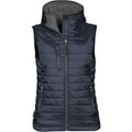 A navy women's thermal vest with a zip front, hood, and multiple zippered pockets. It features a logo on the side.