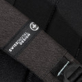 A black Swissdigital Arosa Backpack featuring textured fabric and a branded strap.