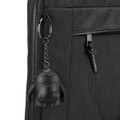 A black laptop sleeve featuring a zipper pocket and a keychain accessory with a cute monster design.